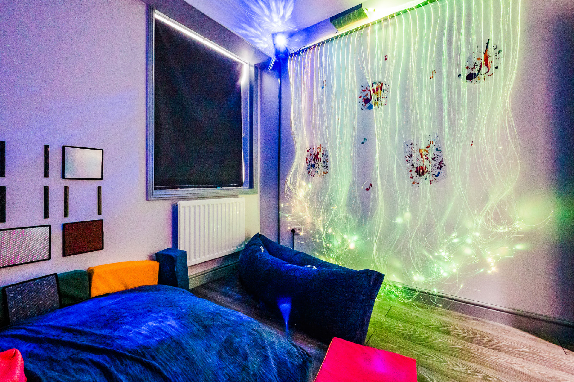 Sensory room with fibre-optic lights and soft seating