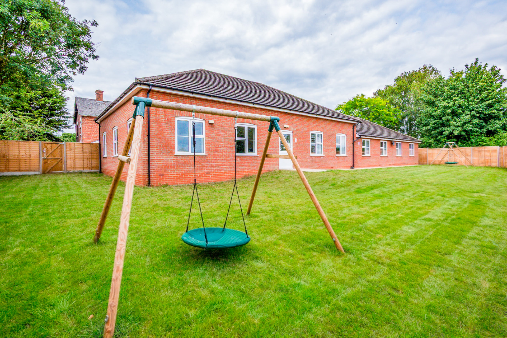 Large garden with swings at Inspire