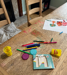 Creative play area with art and crafts at Harlescott House