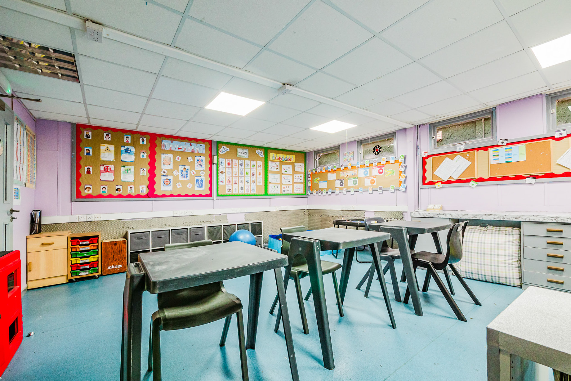 Bright classroom with phonics and science displays